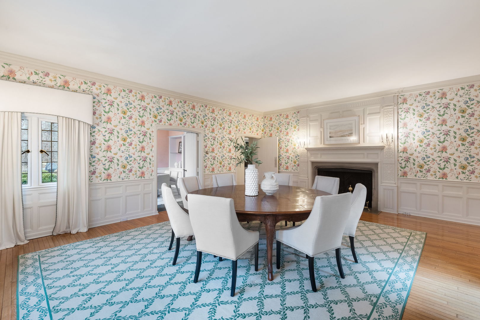 1650 Green Bay Road Lake Bluff, IL 60044 - Photo 16 of 63 a view of a dining room with furniture and wooden floor