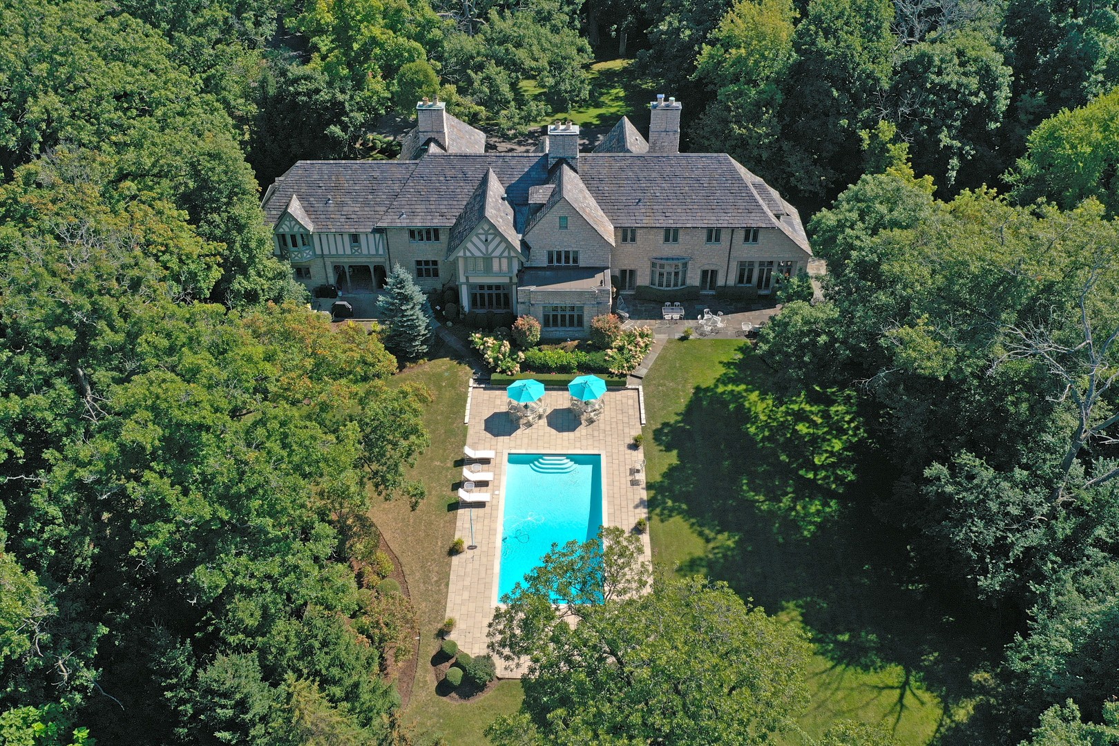 1650 Green Bay Road Lake Bluff, IL 60044 - Photo 2 of 63 an aerial view of a house with a yard and garden