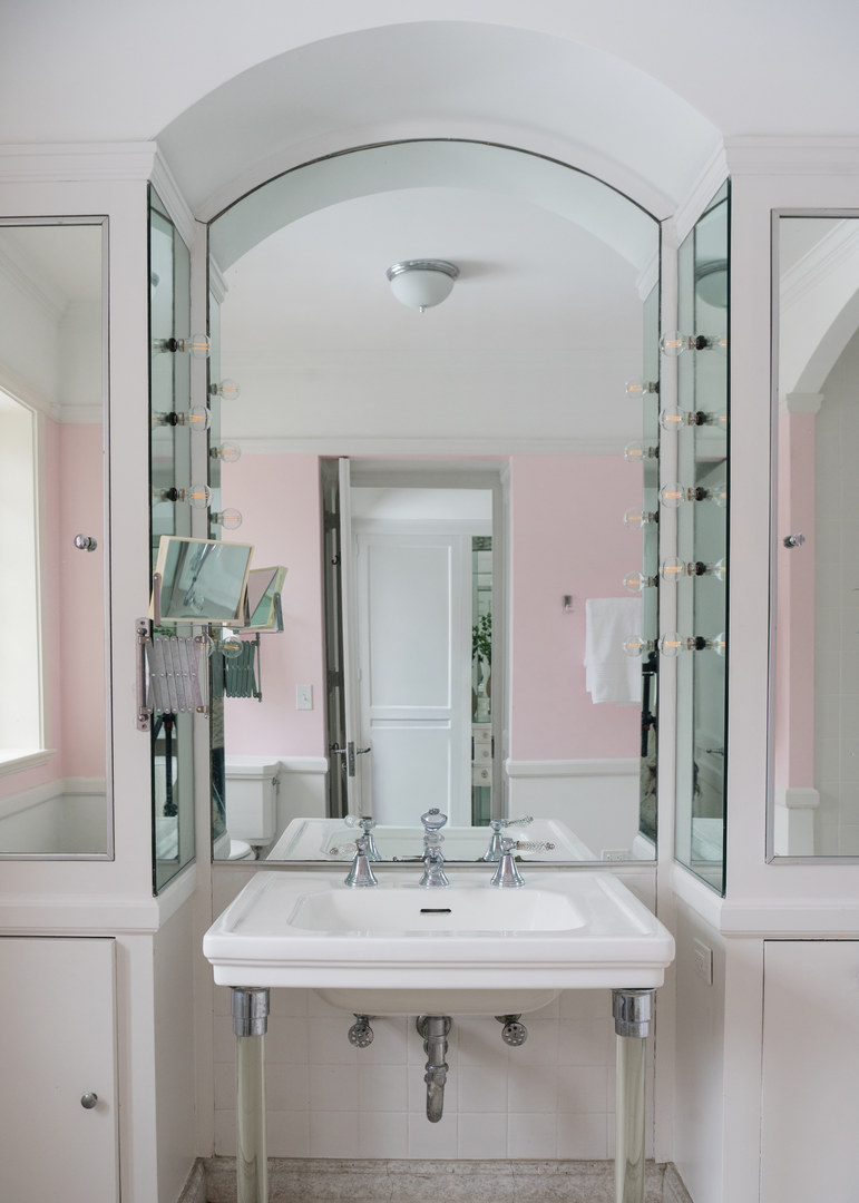 1650 Green Bay Road Lake Bluff, IL 60044 - Photo 37 of 63 a bathroom with a granite countertop sink a mirror and a shower