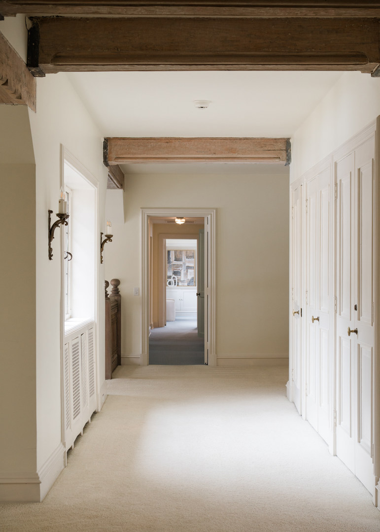 1650 Green Bay Road Lake Bluff, IL 60044 - Photo 39 of 63 a view of a hallway with wooden shelves
