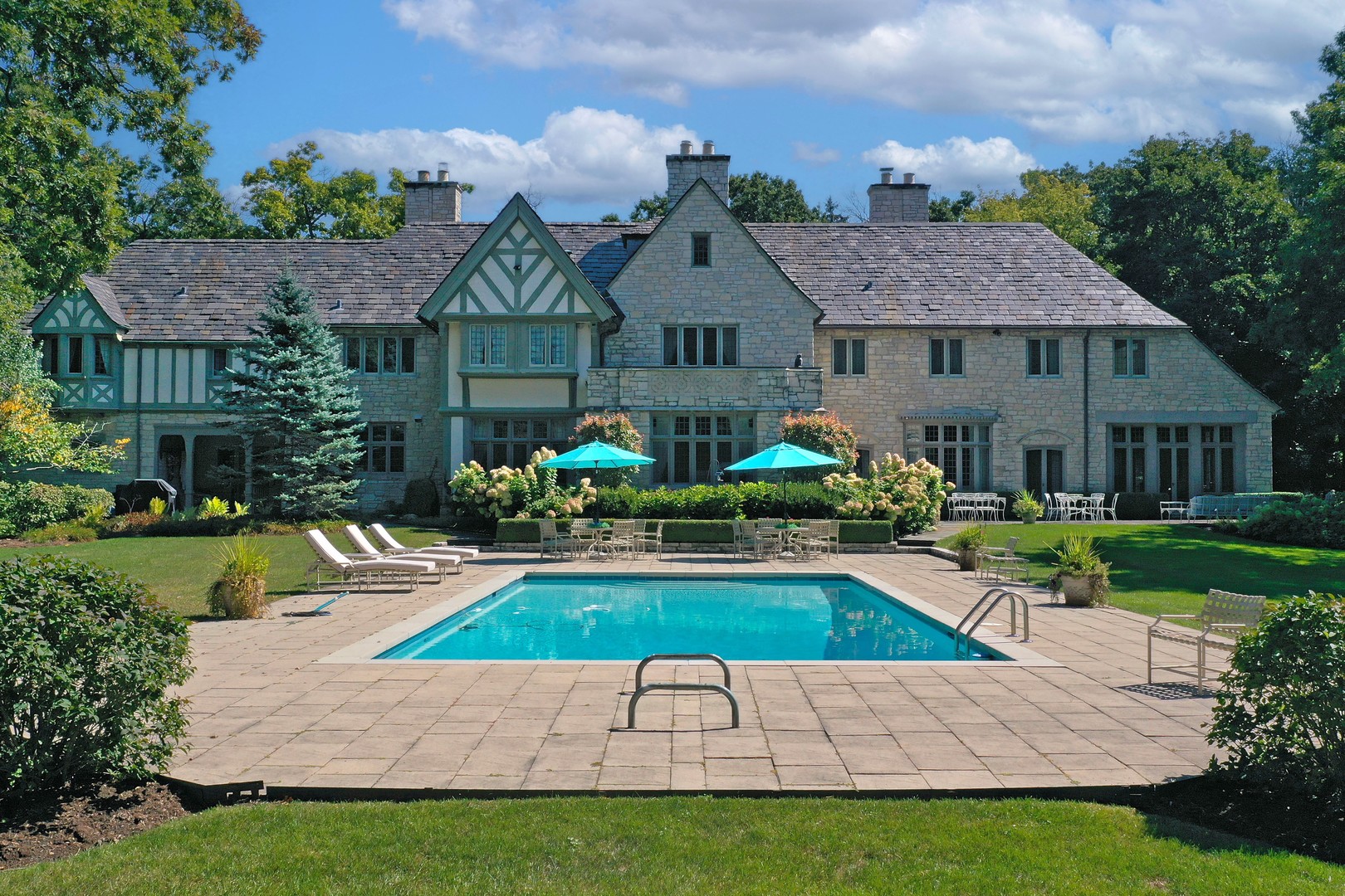 1650 Green Bay Road Lake Bluff, IL 60044 - Photo 46 of 63 a view of house with garden space and swimming pool