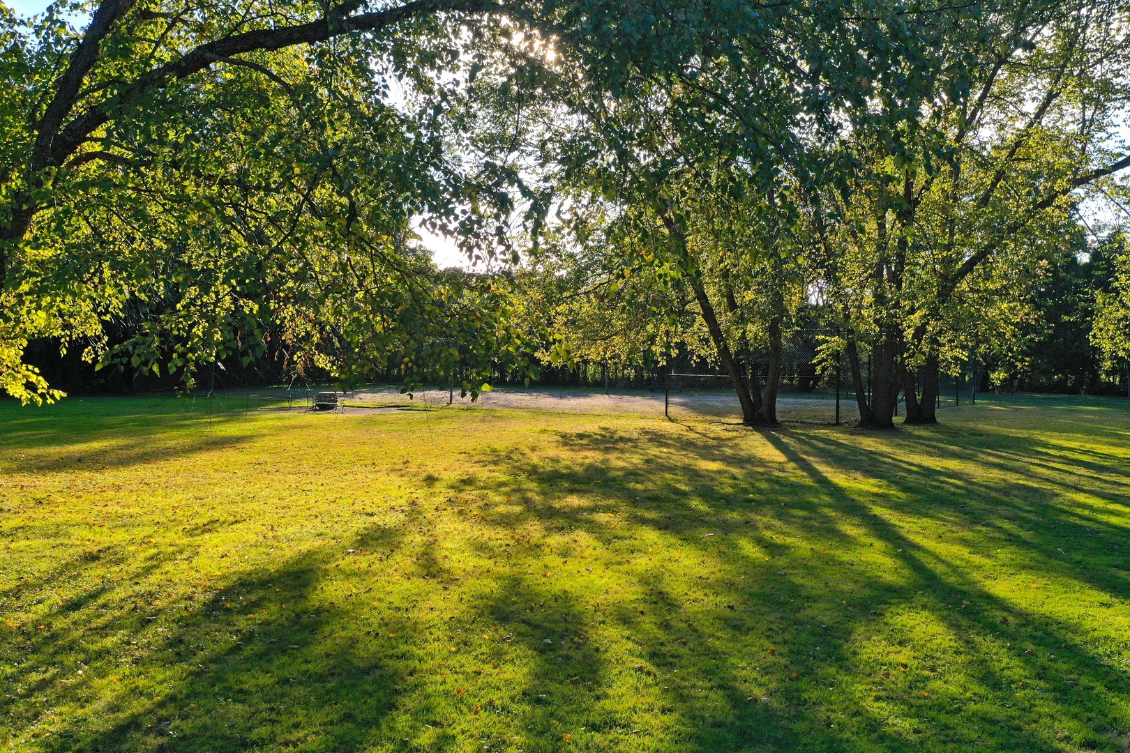 1650 Green Bay Road Lake Bluff, IL 60044 - Photo 52 of 63 a view of a swimming pool with a patio