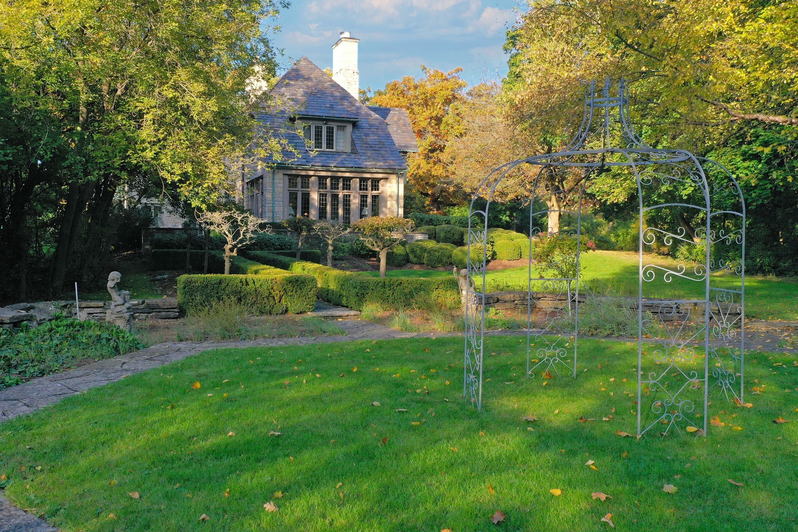 1650 Green Bay Road Lake Bluff, IL 60044 - Photo 54 of 63 a view of a house with a yard and a slide