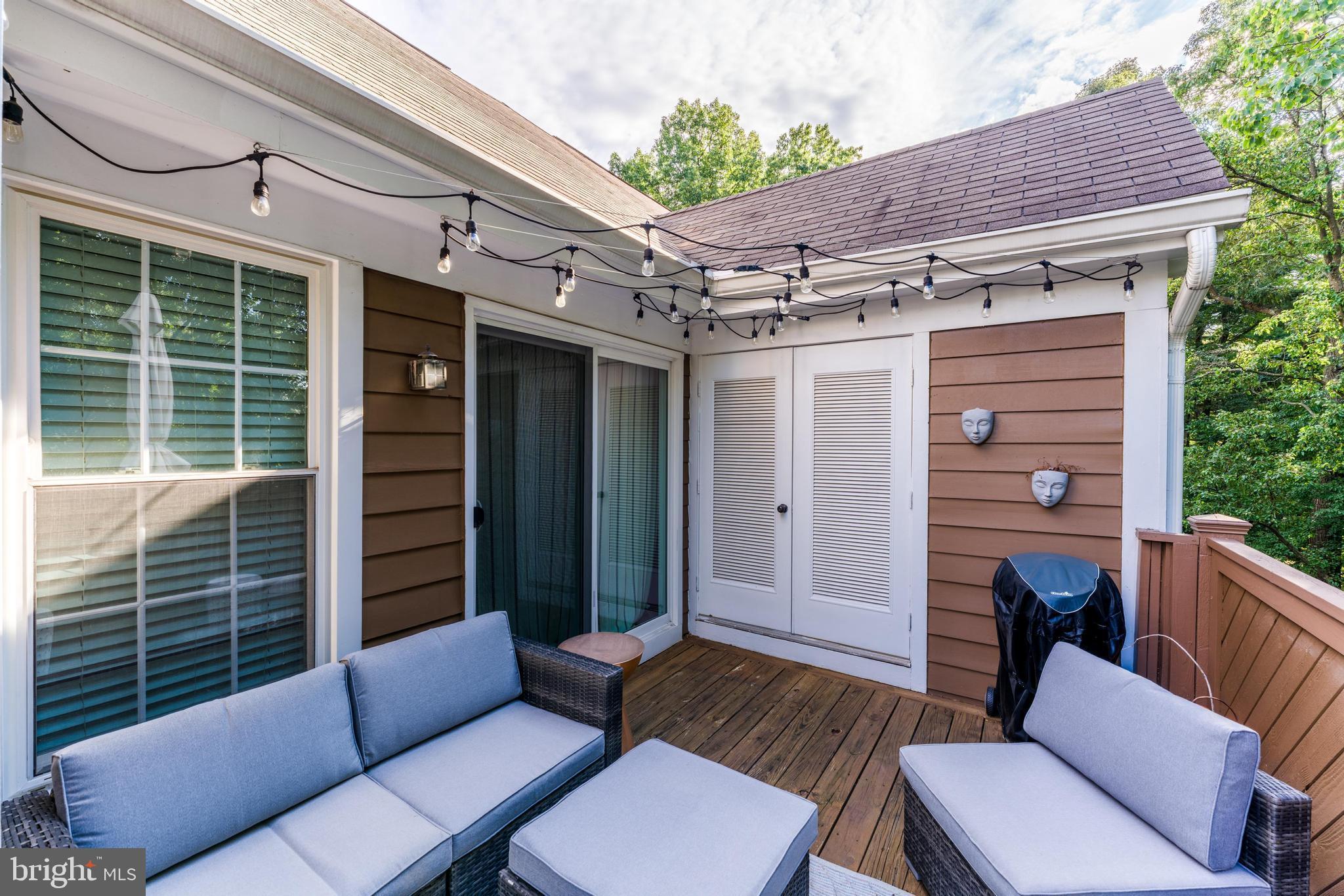 1519 Church Hill Place Reston, VA 20194 - Photo 11 of 14 a balcony with furniture and a potted plant