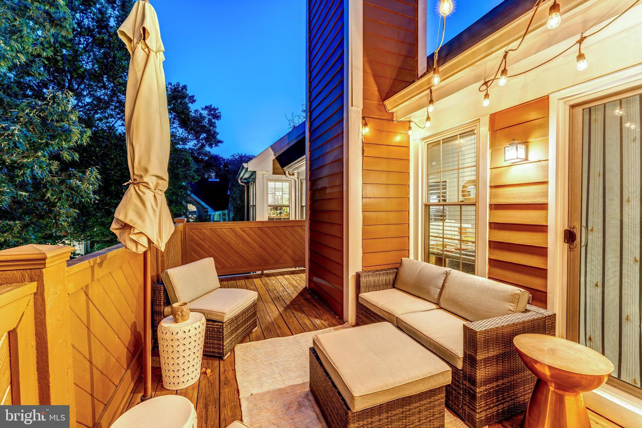1519 Church Hill Place Reston, VA 20194 - Photo 12 of 14 a backyard of a house with barbeque oven table and chairs
