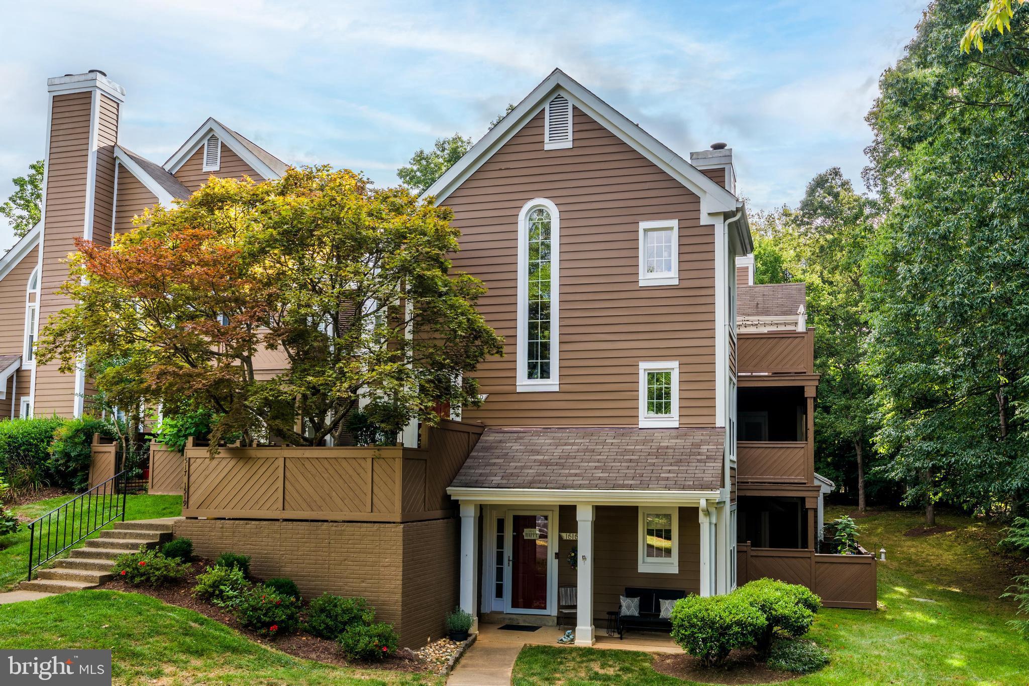 1519 Church Hill Place Reston, VA 20194 - Photo 14 of 14 a front view of a house with garden