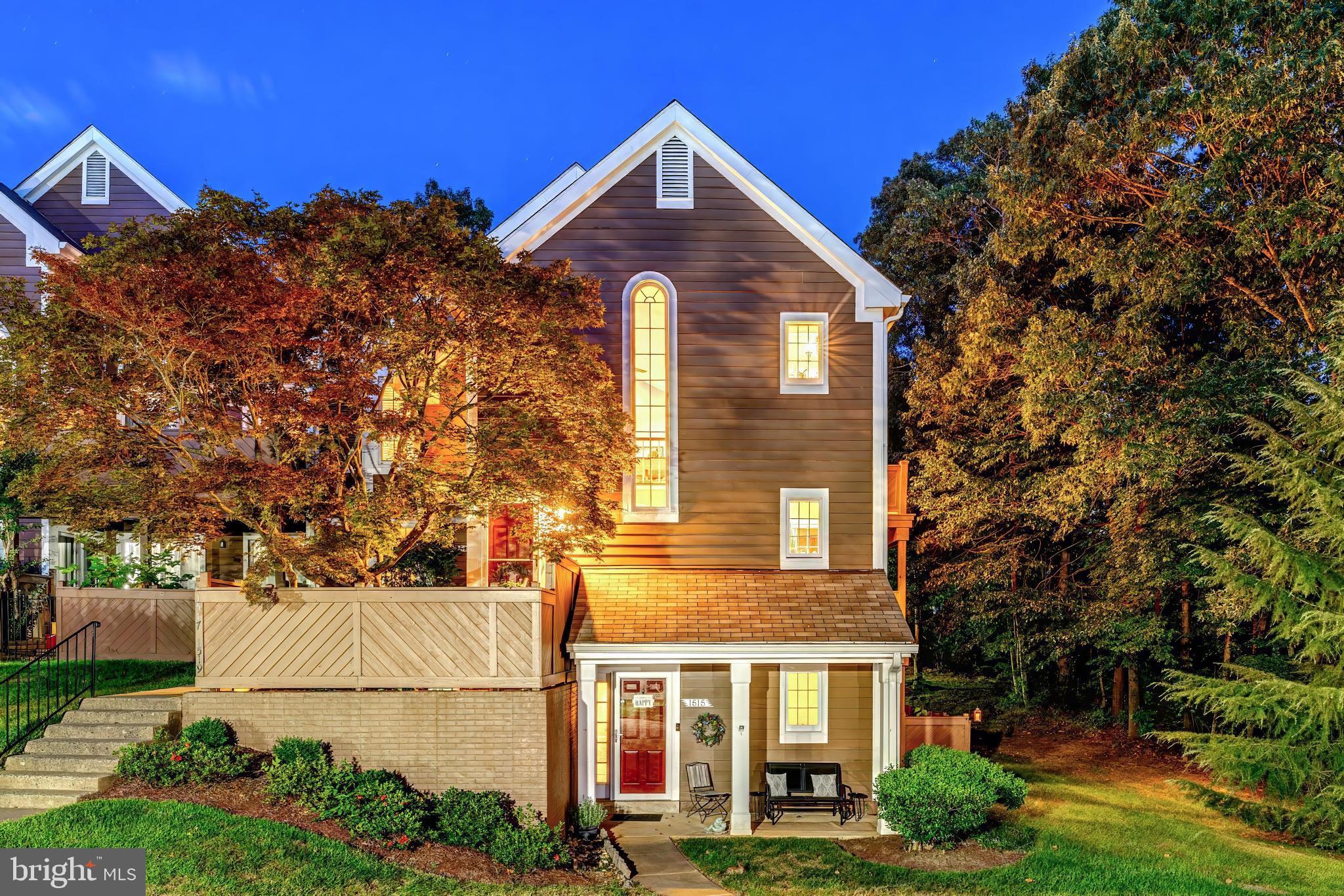 1519 Church Hill Place Reston, VA 20194 - Photo 6 of 14 a front view of a house with a yard