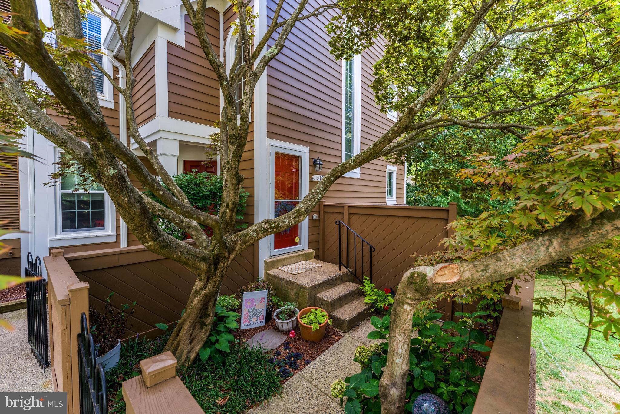 1519 Church Hill Place Reston, VA 20194 - Photo 8 of 14 a view of a house with backyard and sitting area