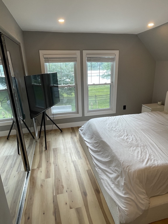 35 Riverview Drive Gill, MA 01354 - Photo 11 of 25 a bed sitting in a bedroom next to a window