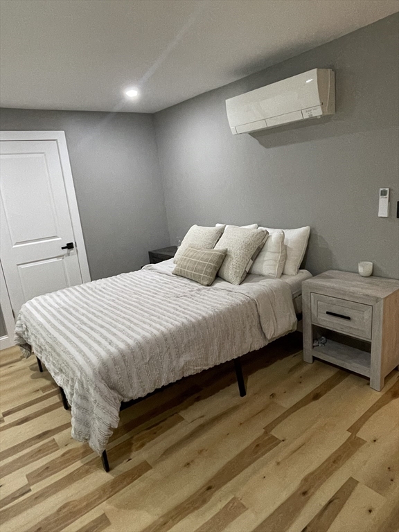 35 Riverview Drive Gill, MA 01354 - Photo 12 of 25 a bedroom with a bed and a dresser