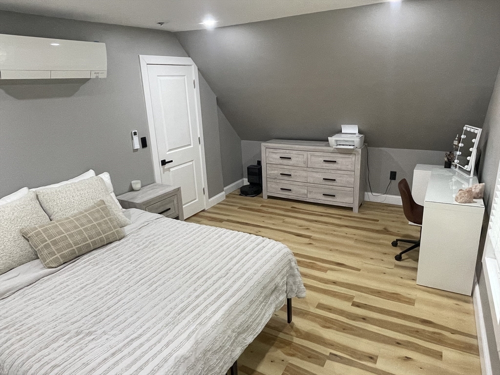 35 Riverview Drive Gill, MA 01354 - Photo 15 of 25 a bedroom with a bed and a couch