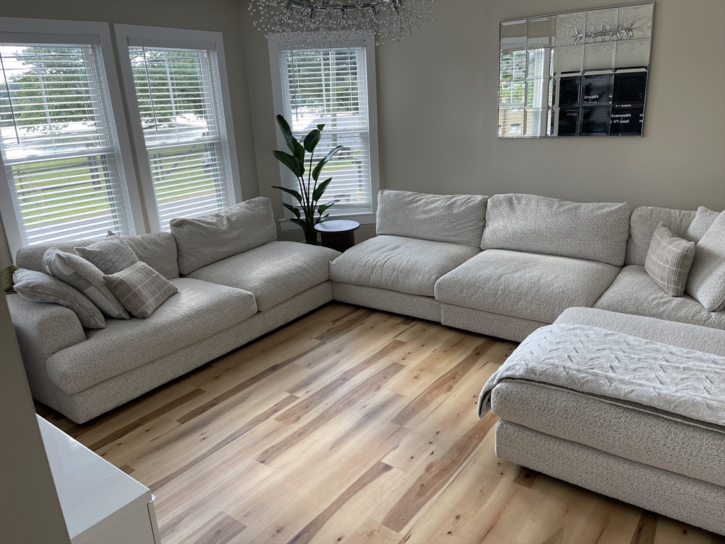 35 Riverview Drive Gill, MA 01354 - Photo 16 of 25 a living room with furniture and a potted plant