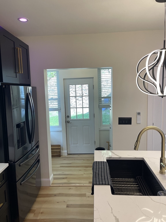 35 Riverview Drive Gill, MA 01354 - Photo 24 of 25 a kitchen with a refrigerator and a sink
