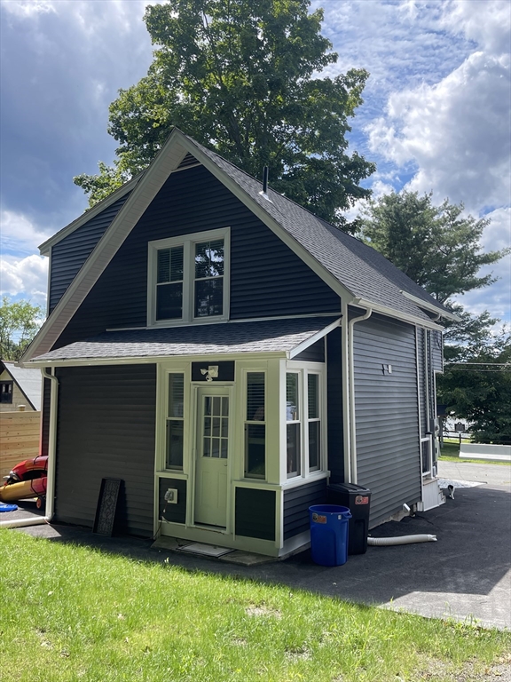 35 Riverview Drive Gill, MA 01354 - Photo 4 of 25 a front view of a house with a yard
