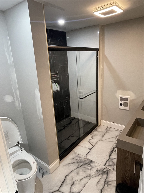 35 Riverview Drive Gill, MA 01354 - Photo 7 of 25 a bathroom with a granite countertop sink toilet and shower