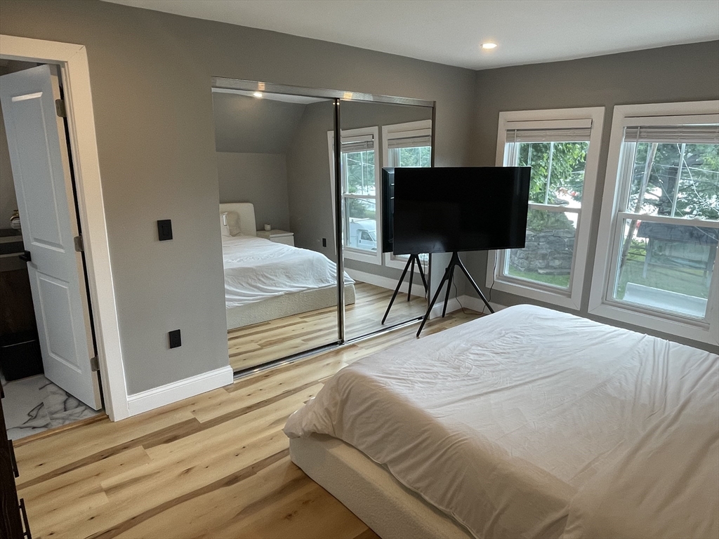 35 Riverview Drive Gill, MA 01354 - Photo 10 of 25 a bedroom with a bed and a window