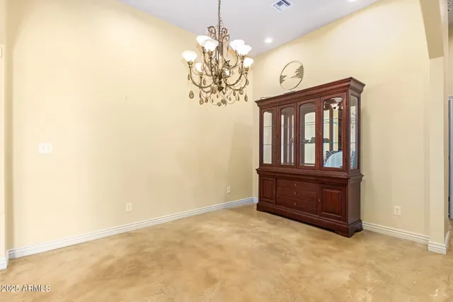 a view of a windows and chandelier in a room