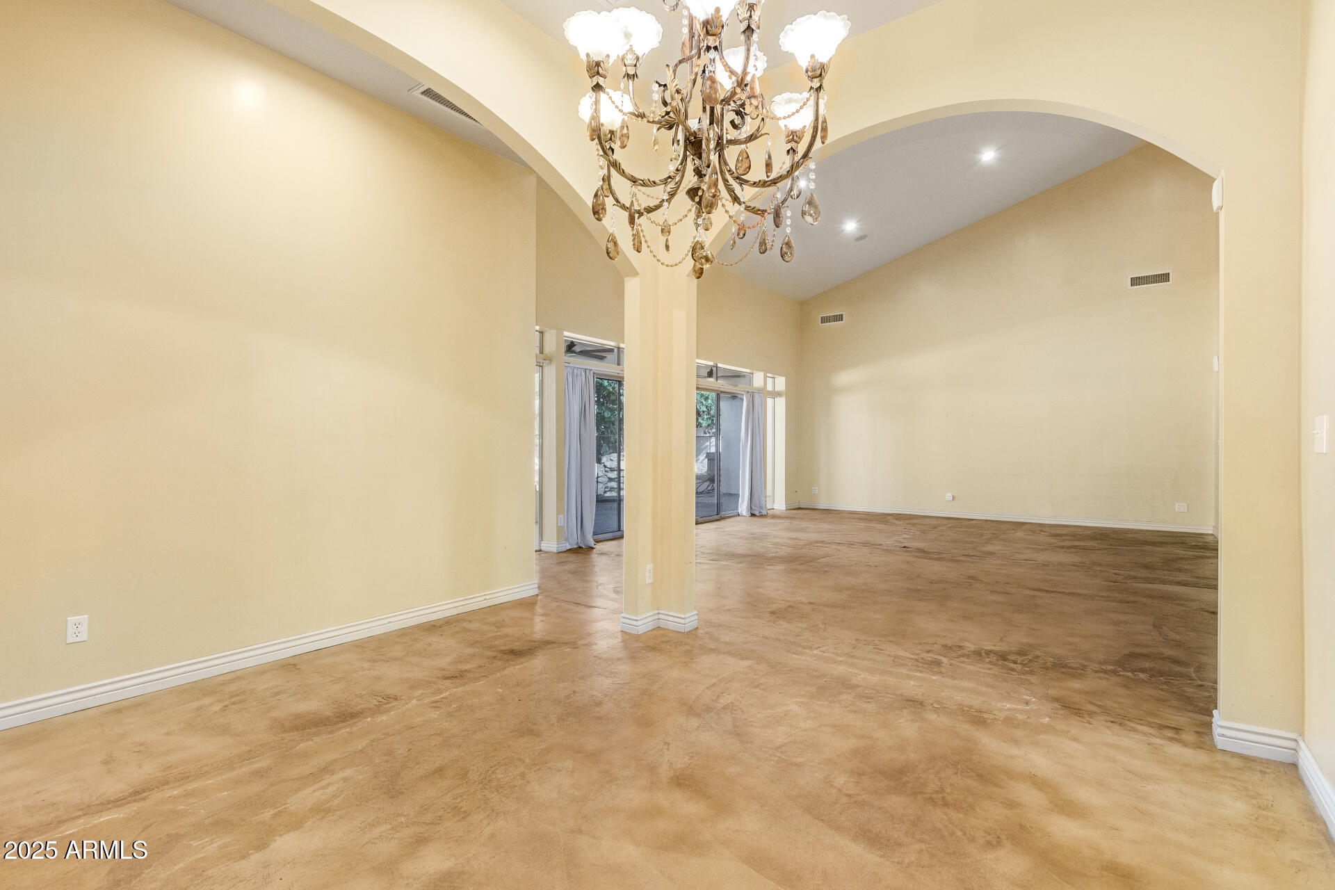 622 West Linger Lane Phoenix, AZ 85021 - Photo 12 of 26 a view of a big room with a chandelier
