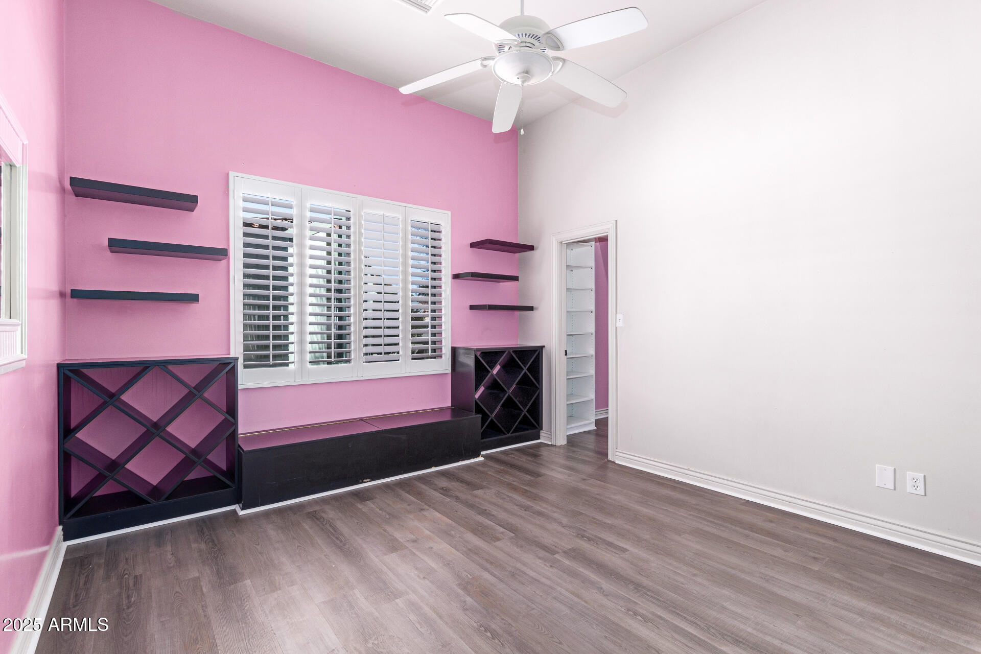 622 West Linger Lane Phoenix, AZ 85021 - Photo 21 of 26 an empty room with windows and fan
