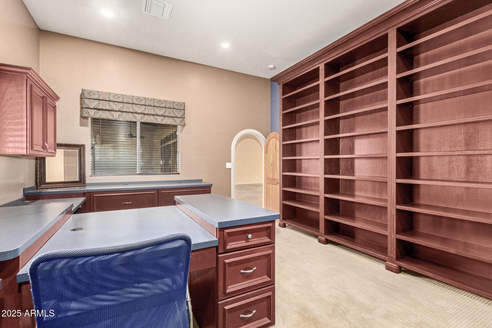 622 West Linger Lane Phoenix, AZ 85021 - Photo 25 of 26 a bedroom with a bed and a dresser