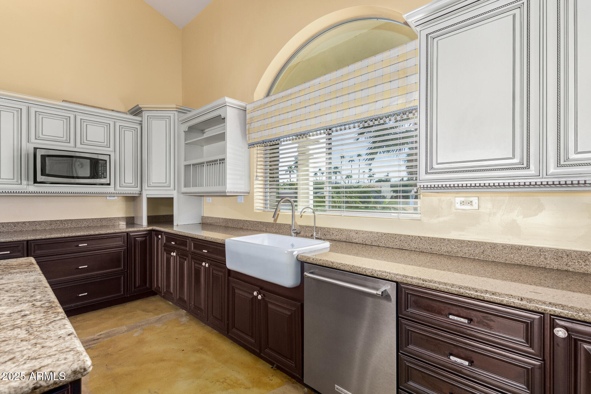 622 West Linger Lane Phoenix, AZ 85021 - Photo 5 of 26 a kitchen with stainless steel appliances granite countertop a sink and a microwave