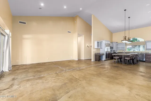 a view of kitchen and dining room with furniture