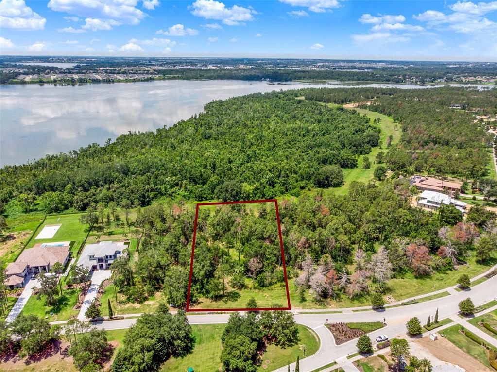 16901 Crete Way Bella Collina, FL 34756 - Photo 2 of 12 a view of a lake with a city