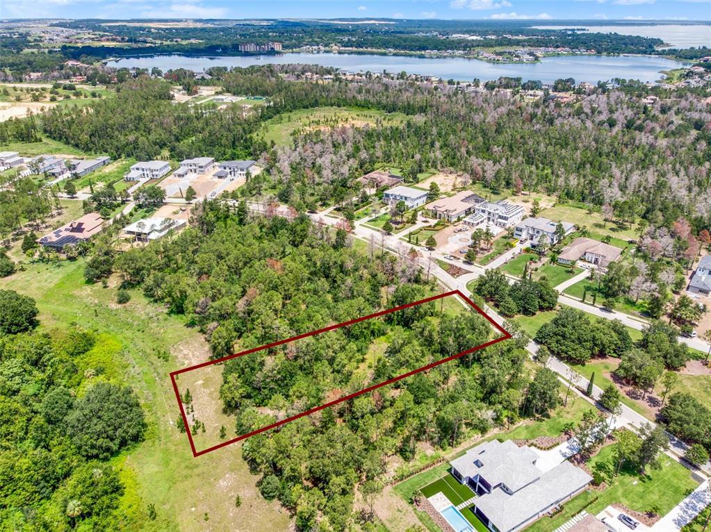 16901 Crete Way Bella Collina, FL 34756 - Photo 5 of 12 an aerial view of residential houses with outdoor space