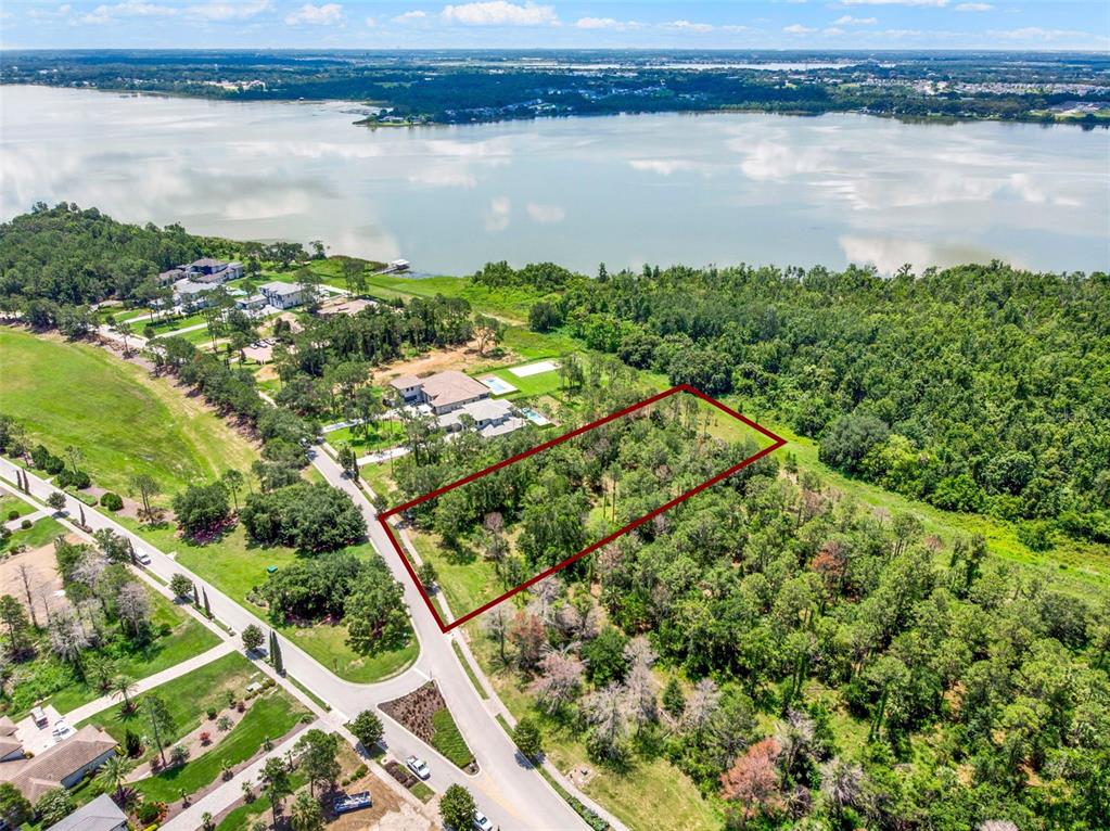 16901 Crete Way Bella Collina, FL 34756 - Photo 8 of 12 a view of a lake with a city