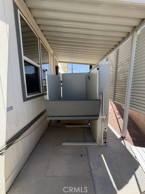 701 Montara Road, Unit 264 Barstow, CA 92311 - Photo 49 of 54 Wheel chair lift at rear entrance