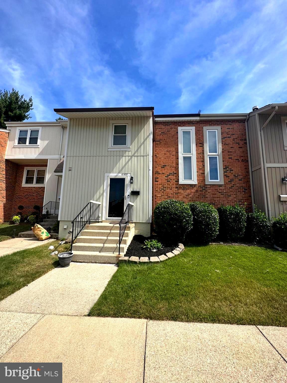 a front view of house with yard