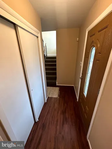 a kitchen with sink microwave and stove