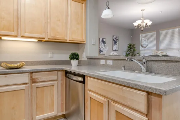 a view of entryway with kitchen