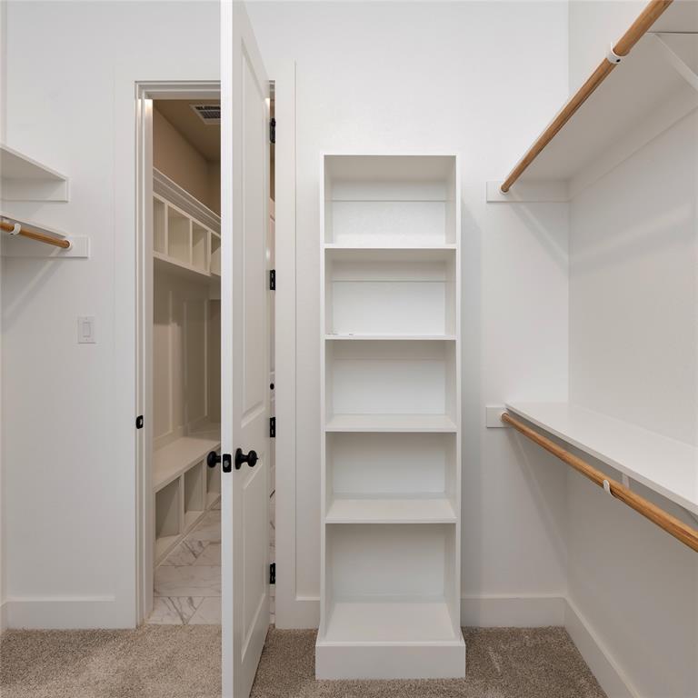 217 Fm 2258 Venus, TX 76084 - Photo 26 of 36 a view of walk in closet with empty racks
