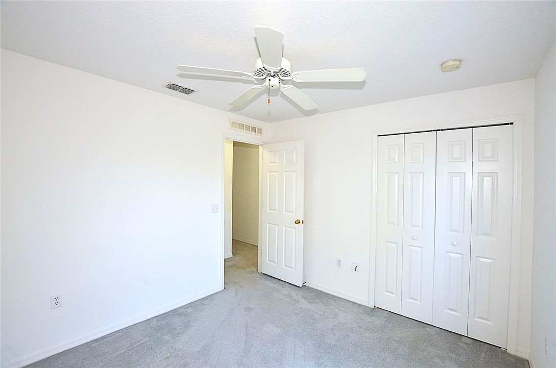 649 Chesser Avenue Sebastian, FL 32958 - Photo 22 of 36 a view of a chandelier fan in a room