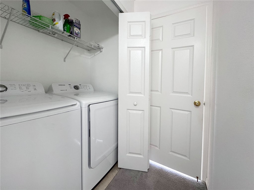 649 Chesser Avenue Sebastian, FL 32958 - Photo 29 of 36 a view of storage and utility room with washer and dryer