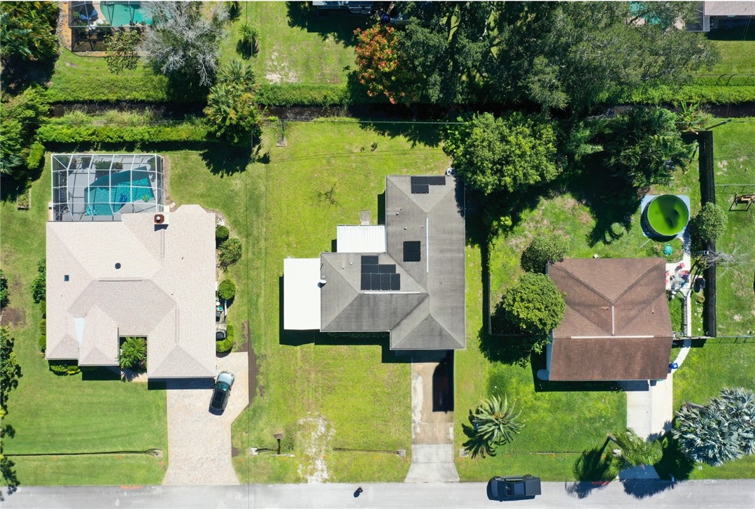 649 Chesser Avenue Sebastian, FL 32958 - Photo 36 of 36 an aerial view of residential house with outdoor space and swimming pool
