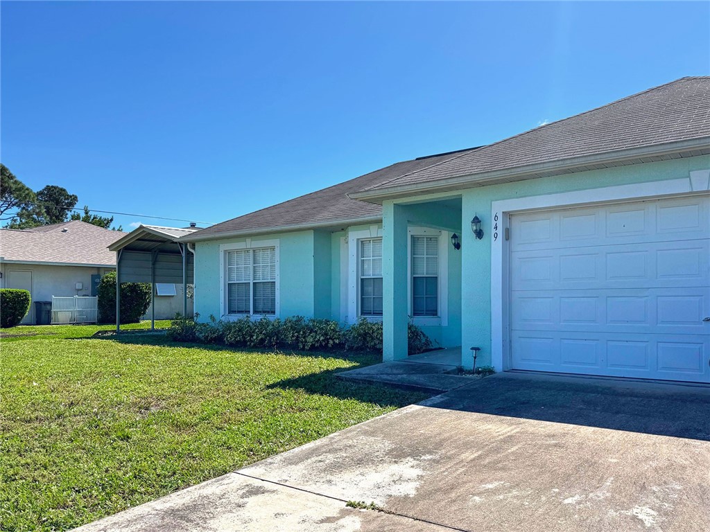 649 Chesser Avenue Sebastian, FL 32958 - Photo 7 of 36 a view of a house with a yard