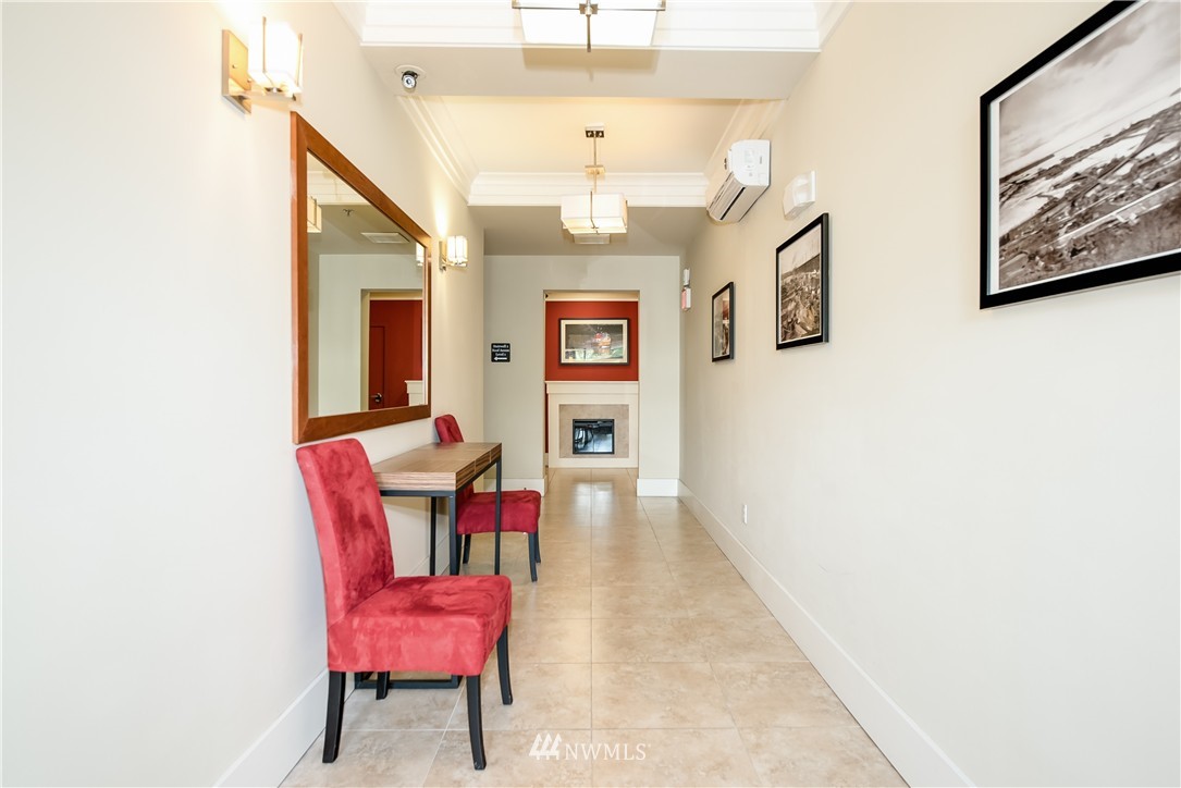 3232 15th Avenue West Seattle, WA 98119 - Photo 6 of 18 a living room with furniture