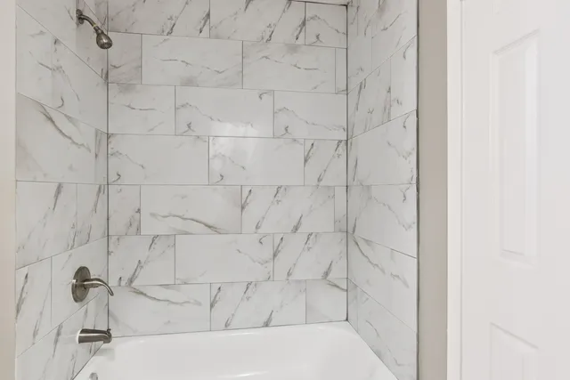 a bathroom with a bathtub