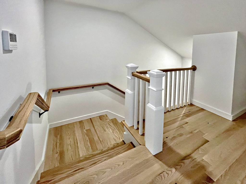 14 Dyer Street, Unit 14 Rockland, MA 02370 - Photo 8 of 16 a view of a hallway with staircase