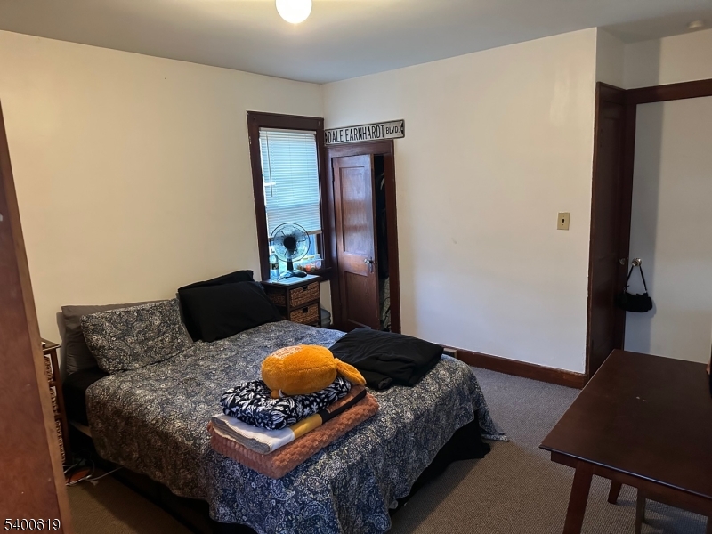209 Morris Street, Unit 2 Phillipsburg, NJ 08865 - Photo 11 of 12 a living room with furniture and a window