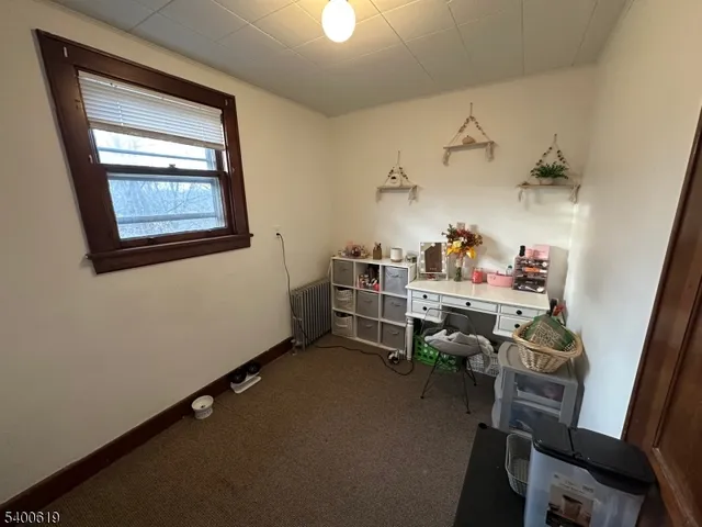 a workspace with furniture and window