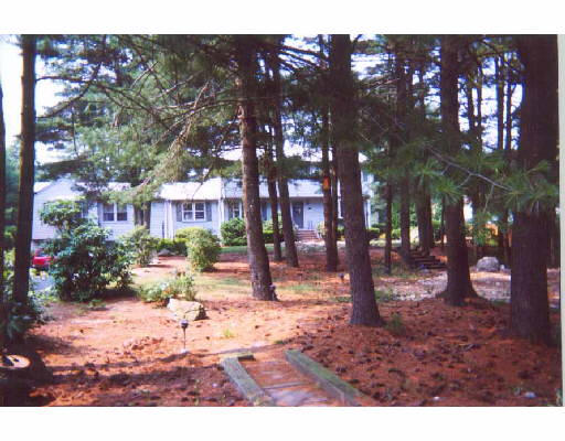 6 Kingsley Road Easton, MA 02356 - Photo 1 of 1 a backyard of a house with lots of green space
