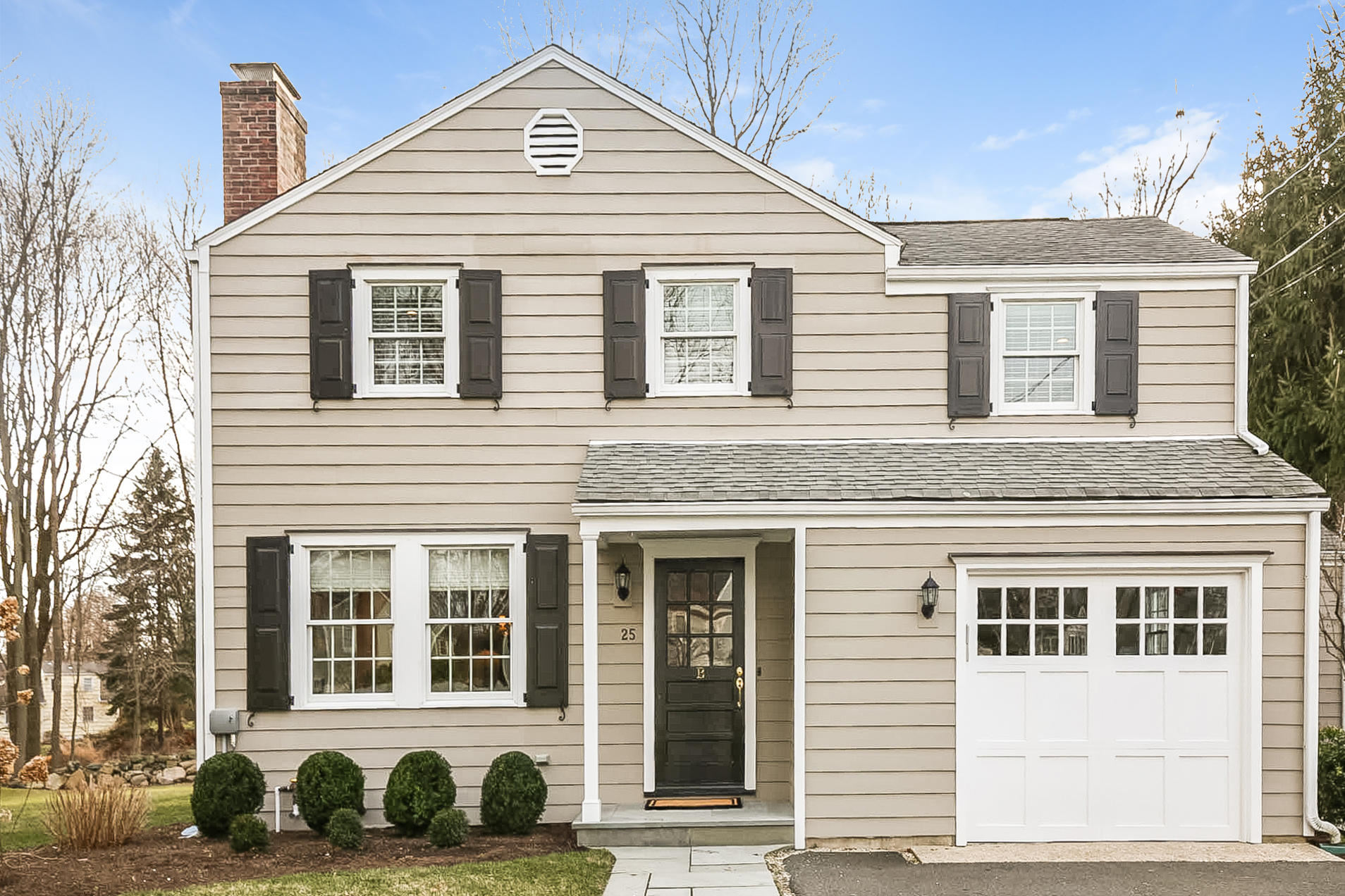 25 Miles Road Darien, CT 06820 - Photo 1 of 30 a front view of a house