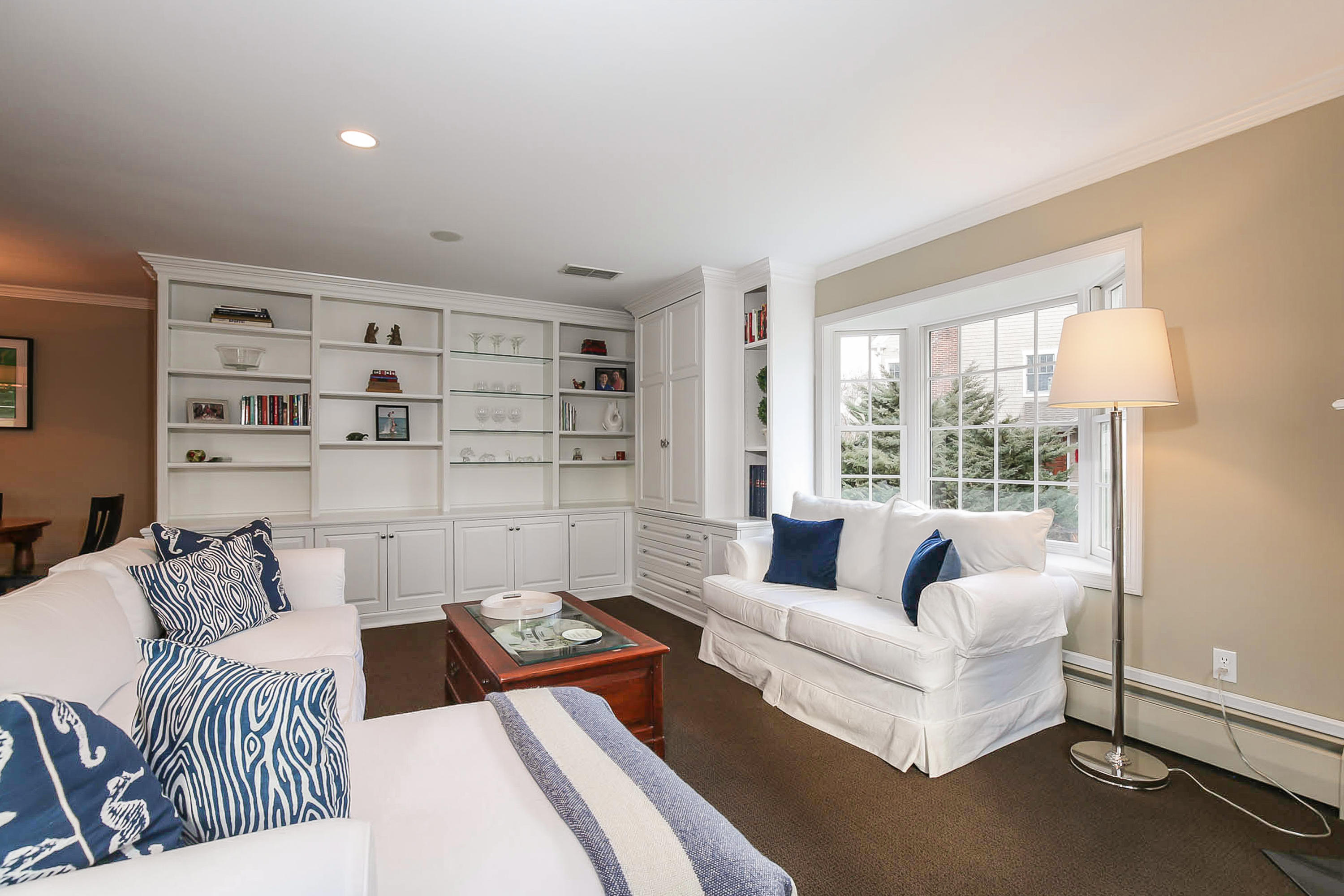 25 Miles Road Darien, CT 06820 - Photo 14 of 30 a living room with furniture and a large window