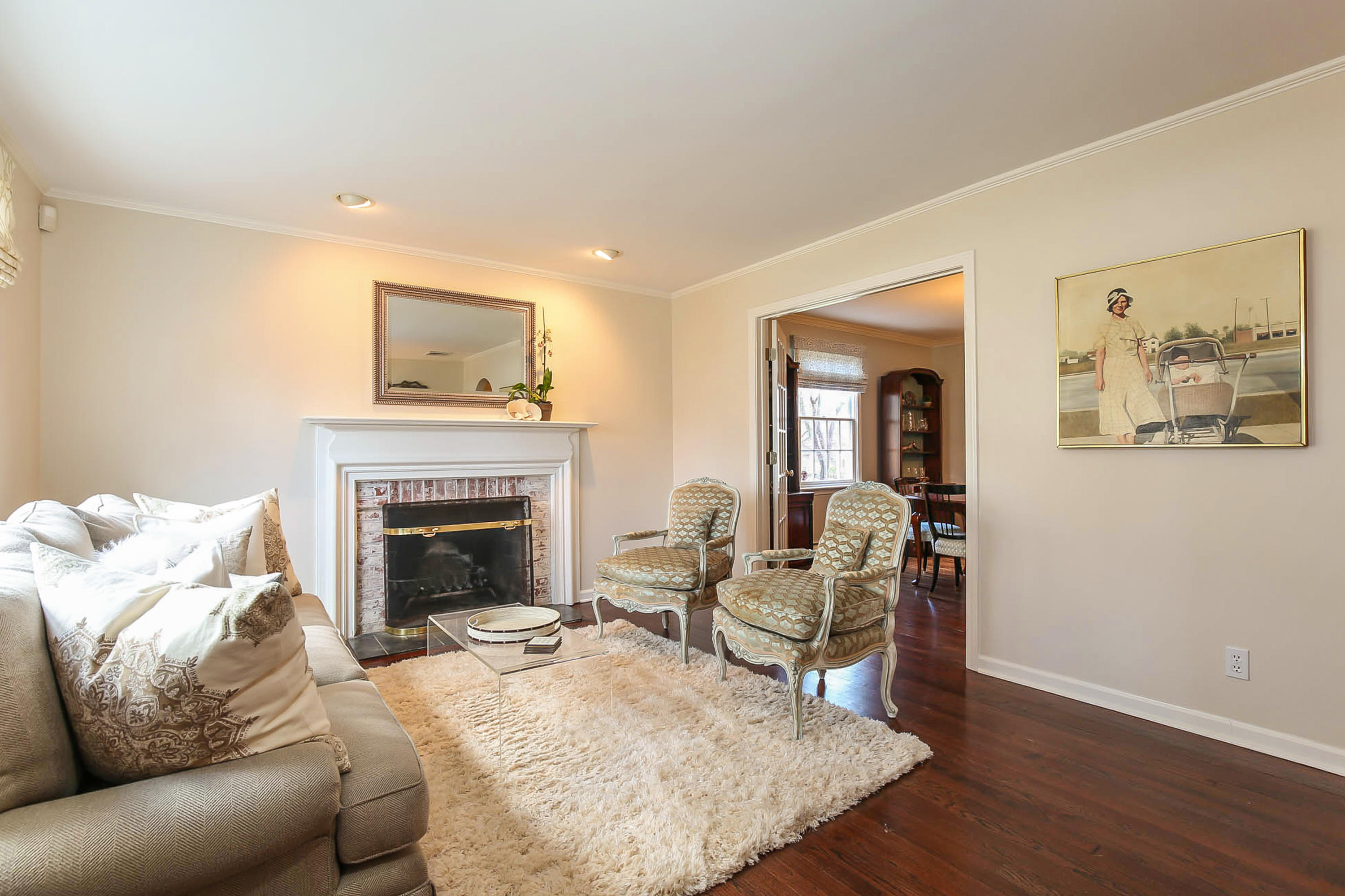 25 Miles Road Darien, CT 06820 - Photo 4 of 30 a living room with furniture and a fireplace