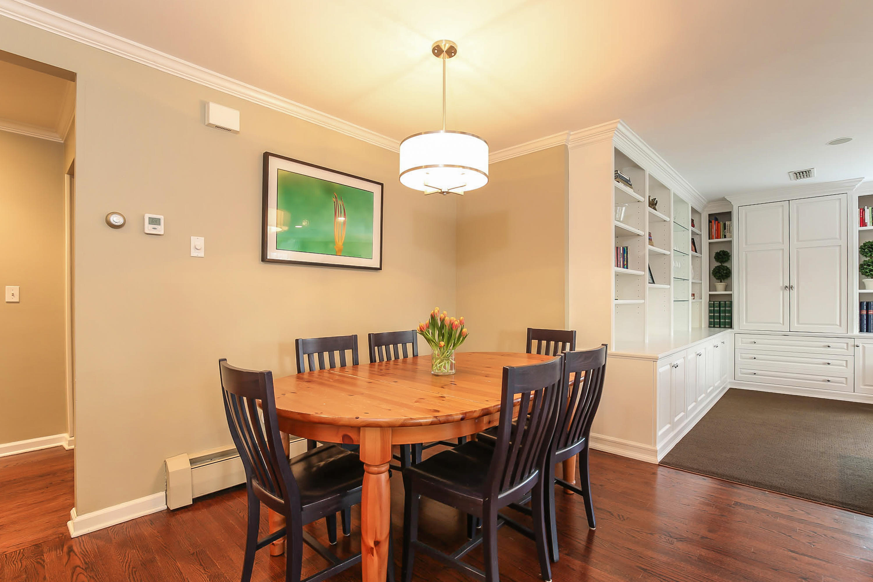 25 Miles Road Darien, CT 06820 - Photo 9 of 30 a view of a dining room with furniture window and wooden floor