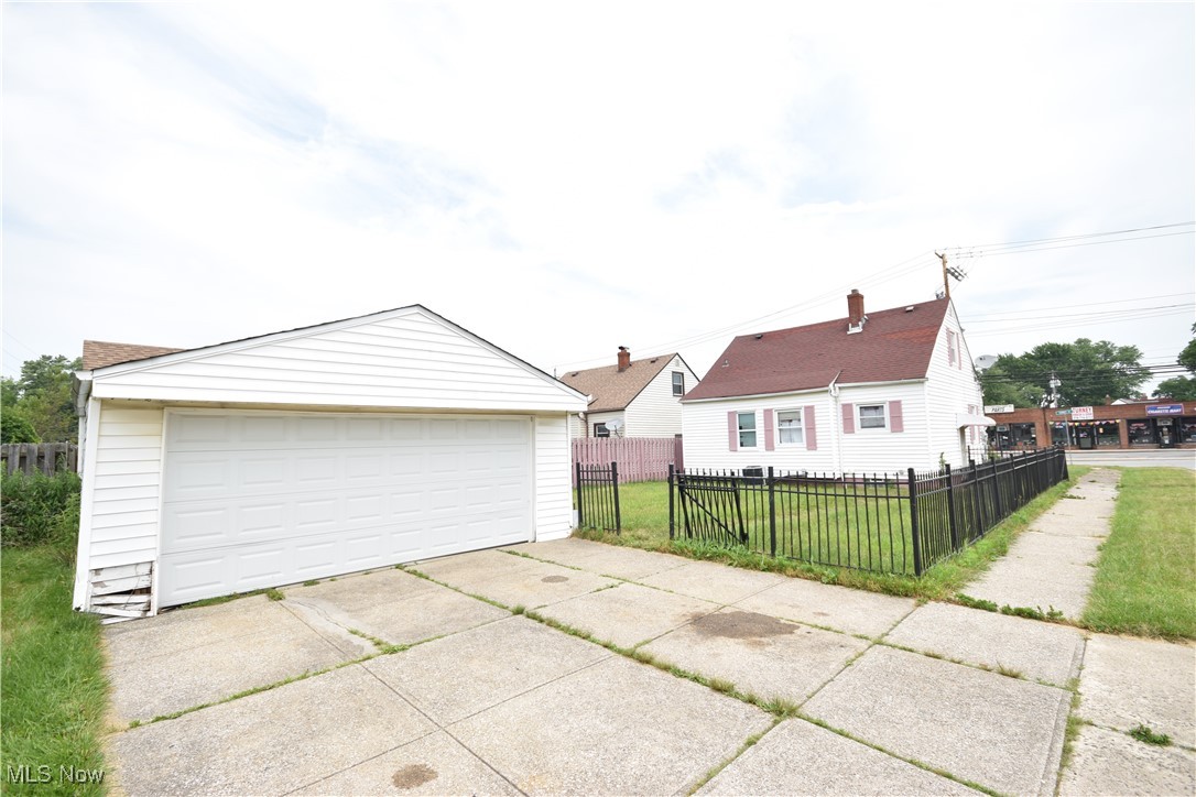 5840 Turney Road Cleveland, OH 44125 - Photo 18 of 21 Garage featuring a yard