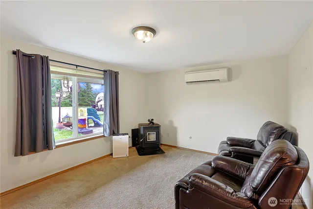 a room with furniture and a window